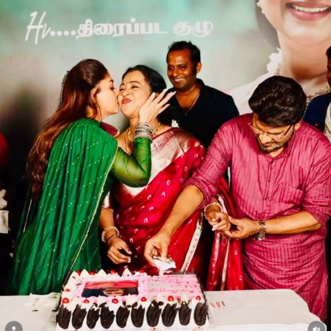 Nayanthara and Radhika Sarathkumar celebrating on film set Nayanthara and Radhika Sarathkumar celebrating on film set