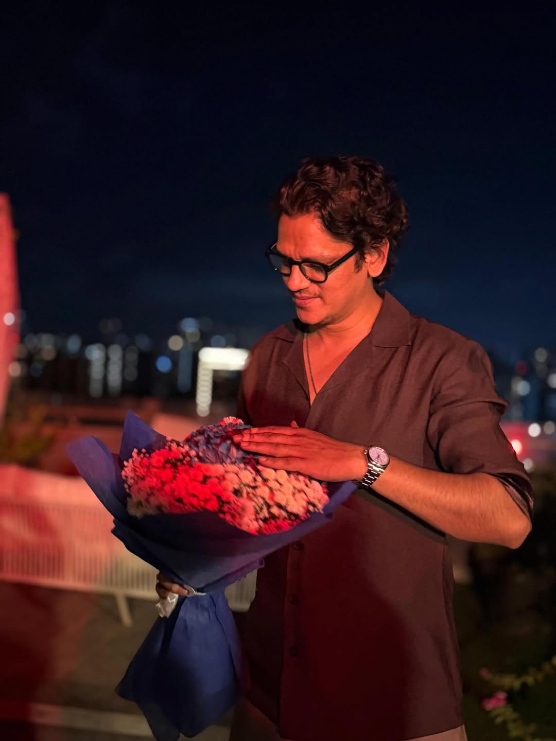 Vijay Varma cutting birthday cake during terrace celebration Vijay Varma cutting birthday cake during terrace celebration