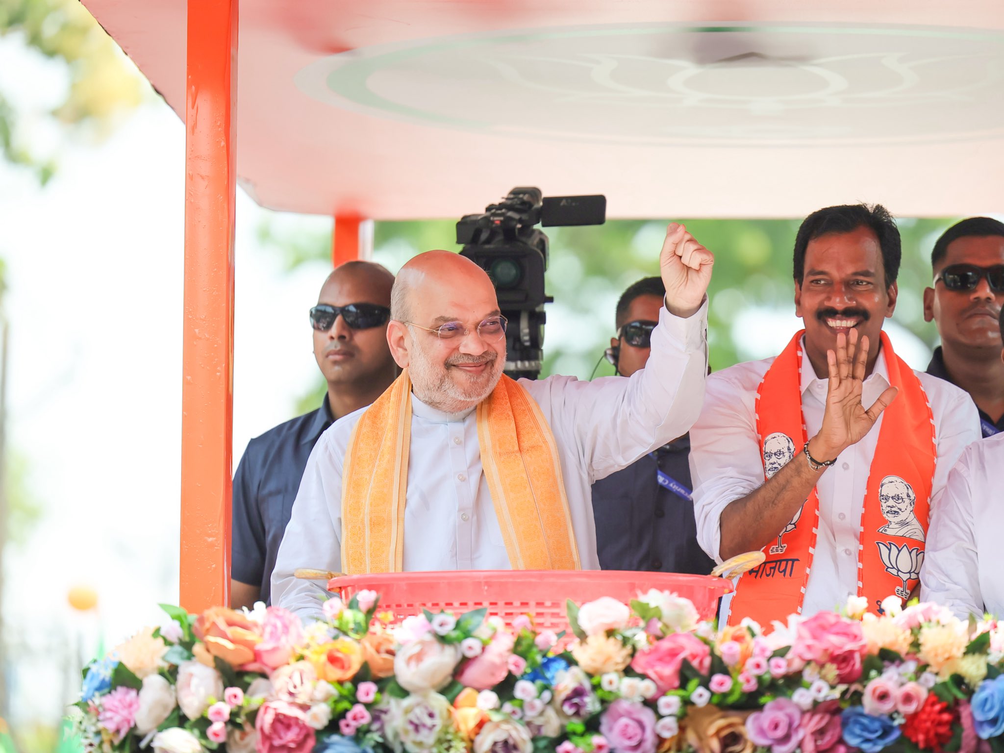 Union Home Minister Amit Shah waving to crowd during Kerala roadshow Union Home Minister Amit Shah waving to crowd during Kerala roadshow