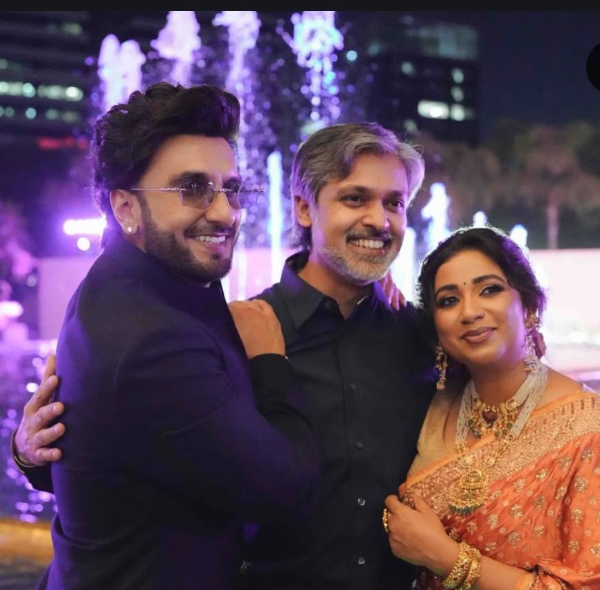 Shreya Ghoshal smiling with Ranveer Singh and husband Shiladitya Shreya Ghoshal smiling with Ranveer Singh and husband Shiladitya