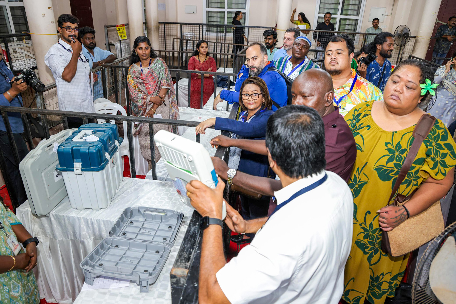 Kerala Assembly polls voting booth with diverse voters Kerala Assembly polls voting booth with diverse voters