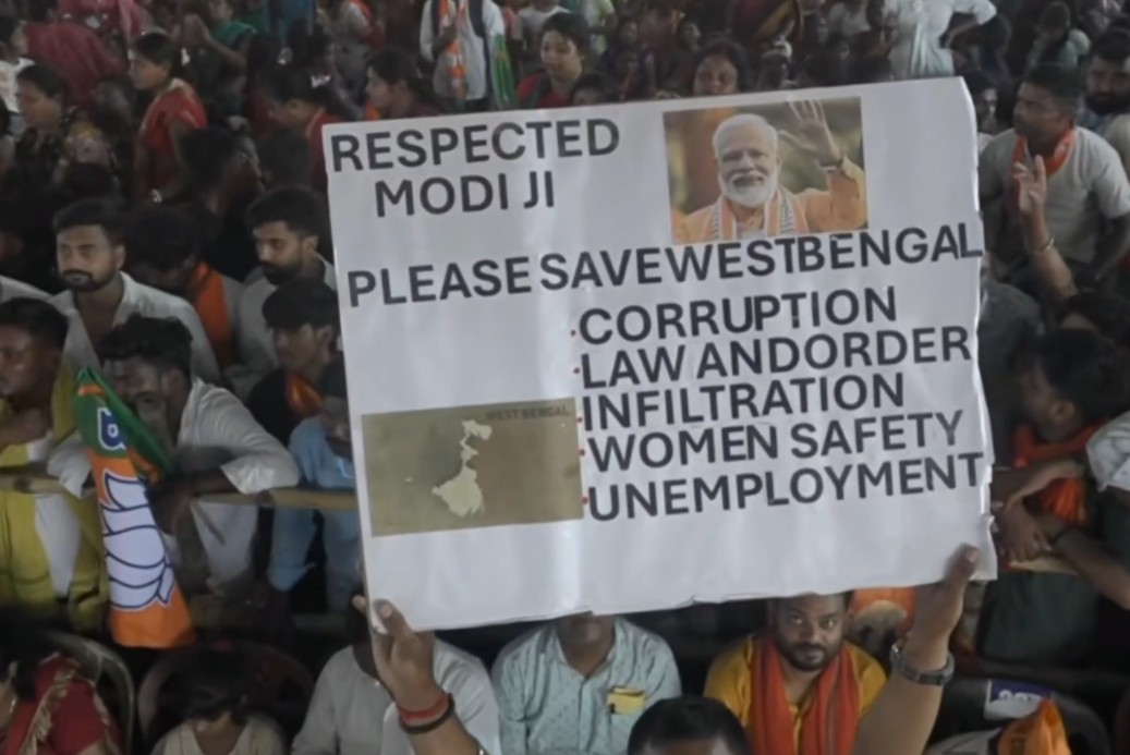 PM Modi addressing rally in Asansol with Save West Bengal poster visible PM Modi addressing rally in Asansol with Save West Bengal poster visible