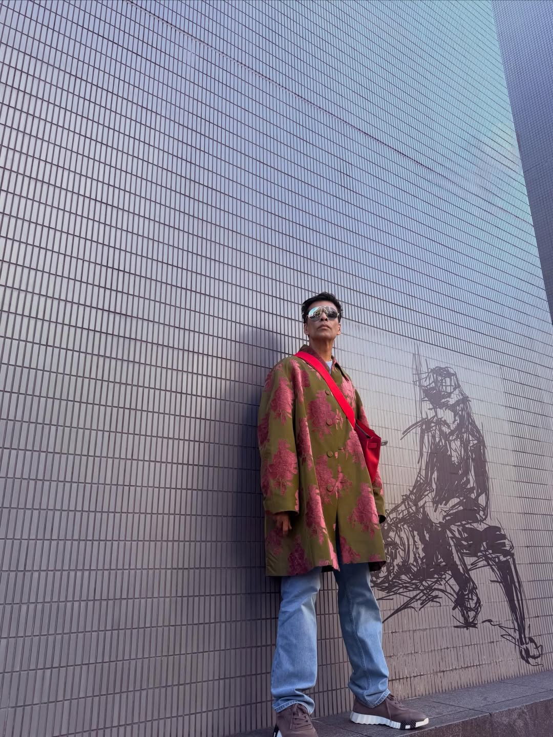 Karan Johar posing in fashionable jacket during Tokyo trip Karan Johar posing in fashionable jacket during Tokyo trip