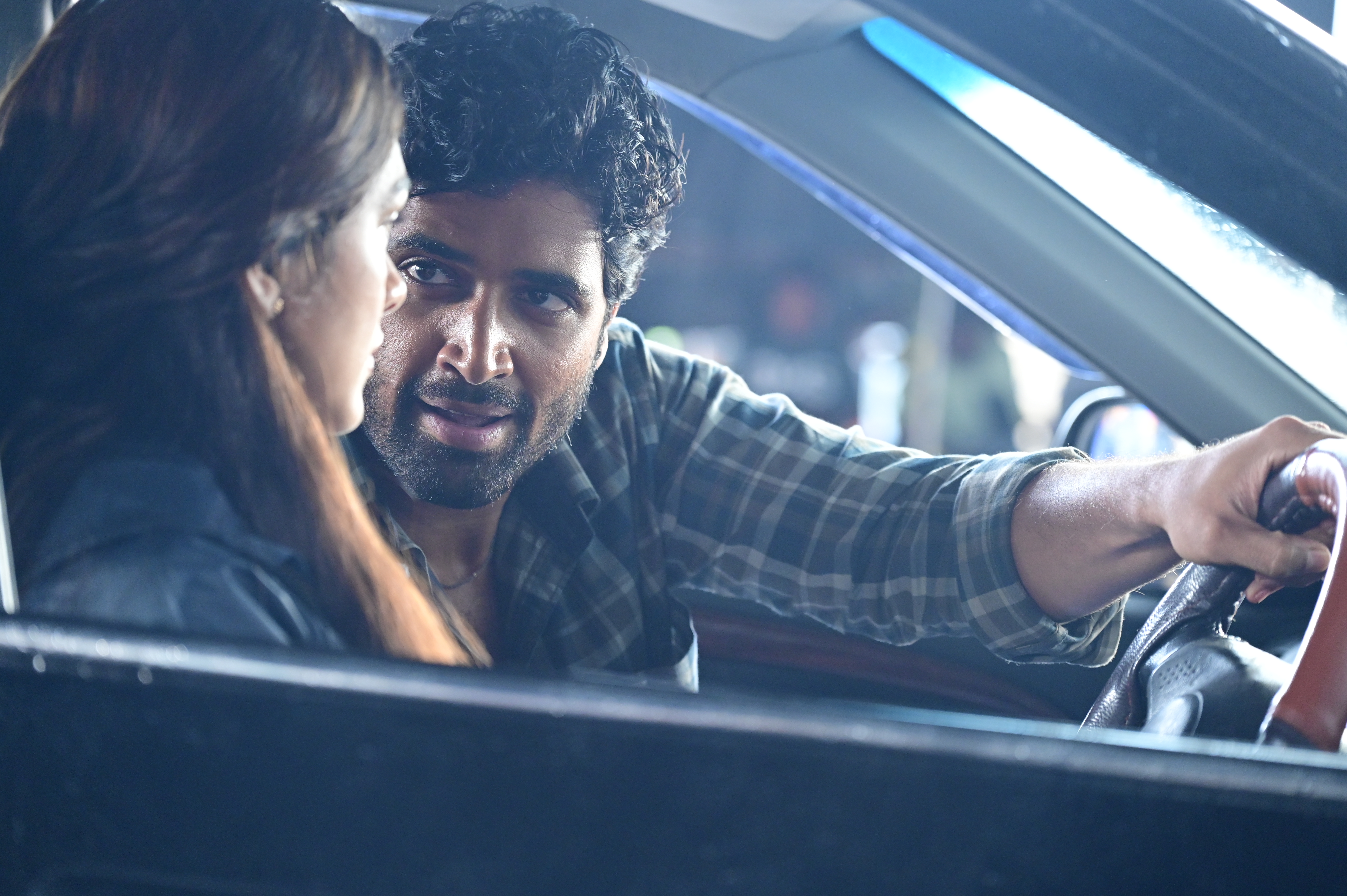Adivi Sesh and Mrunal Thakur in a scene from Dacoit A Love Story movie Adivi Sesh and Mrunal Thakur in a scene from Dacoit A Love Story movie