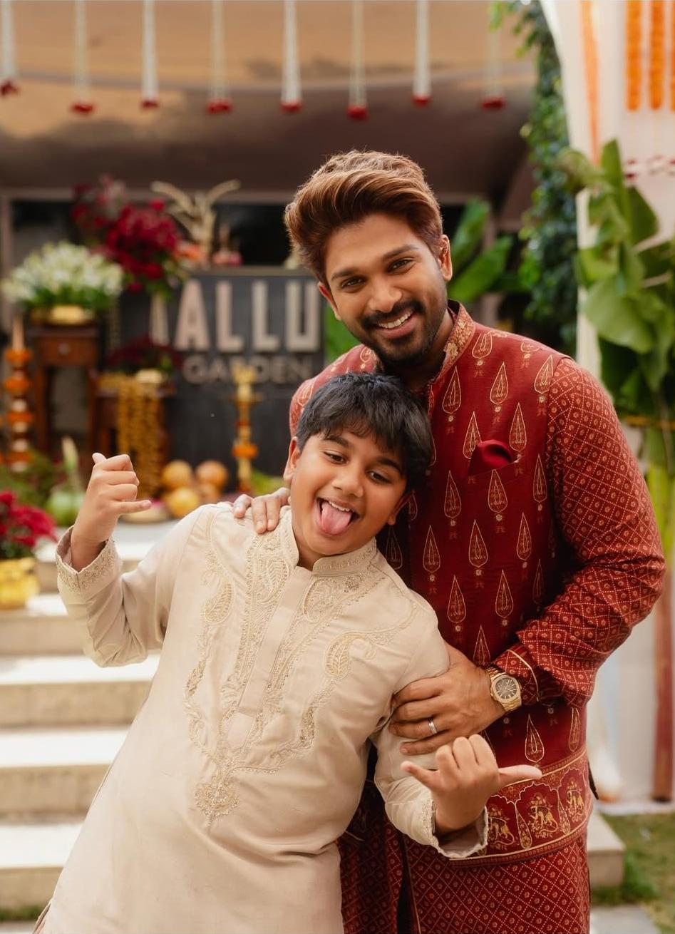 Allu Arjun and his son Allu Ayaan smiling together in traditional Indian outfits Allu Arjun and his son Allu Ayaan smiling together in traditional Indian outfits