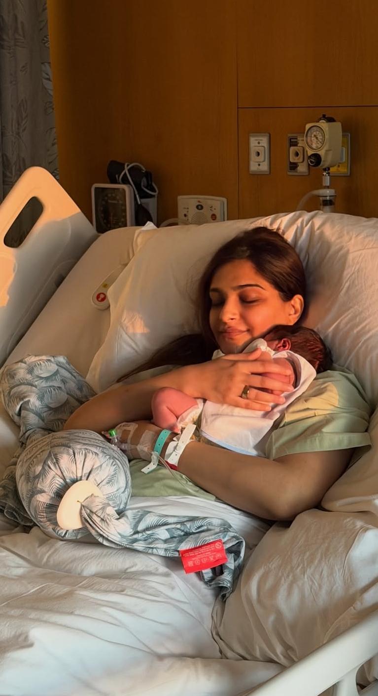 Sonam Kapoor holding her newborn baby boy in hospital Sonam Kapoor holding her newborn baby boy in hospital