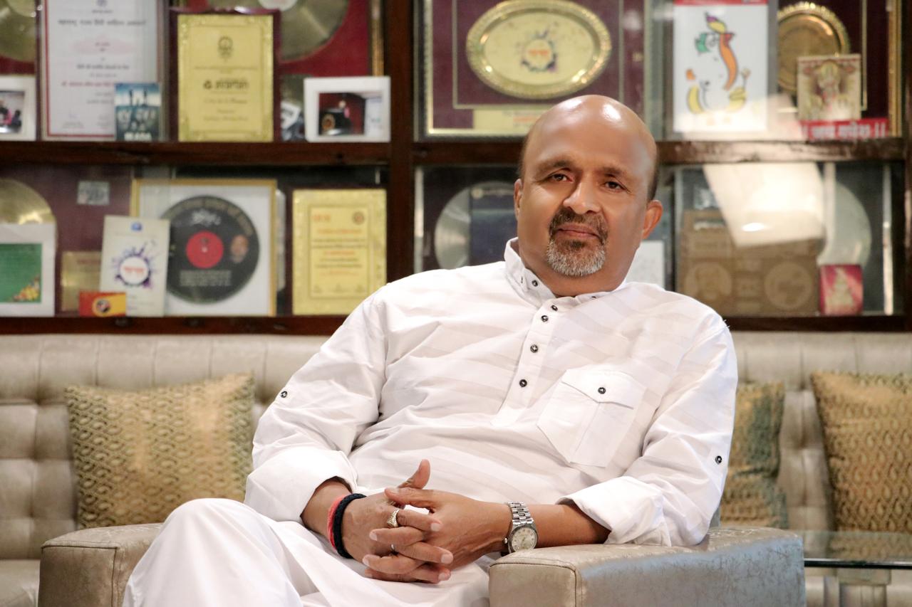 Lyricist Sameer Anjaan discussing AI music and emotion at Aumora Music launch Lyricist Sameer Anjaan discussing AI music and emotion at Aumora Music launch