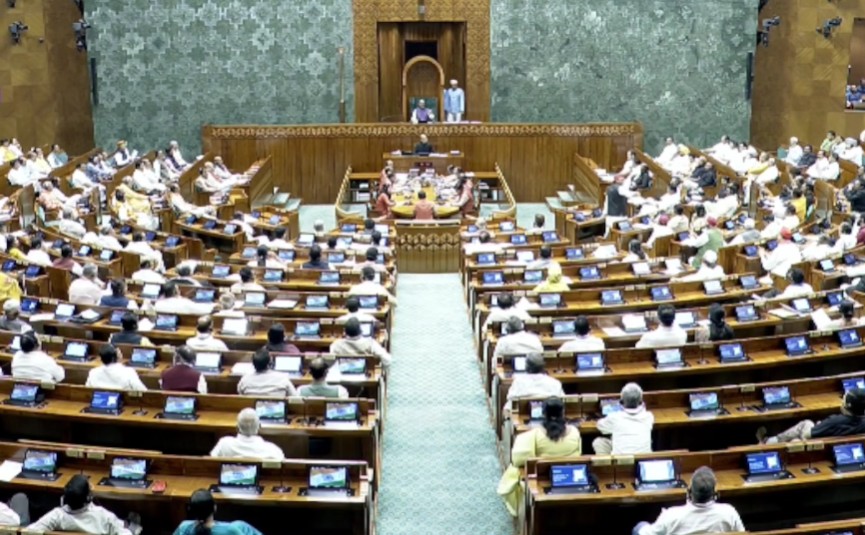 Lok Sabha session discussing Women's Reservation Bill with ministers at podium Lok Sabha session discussing Women's Reservation Bill with ministers at podium