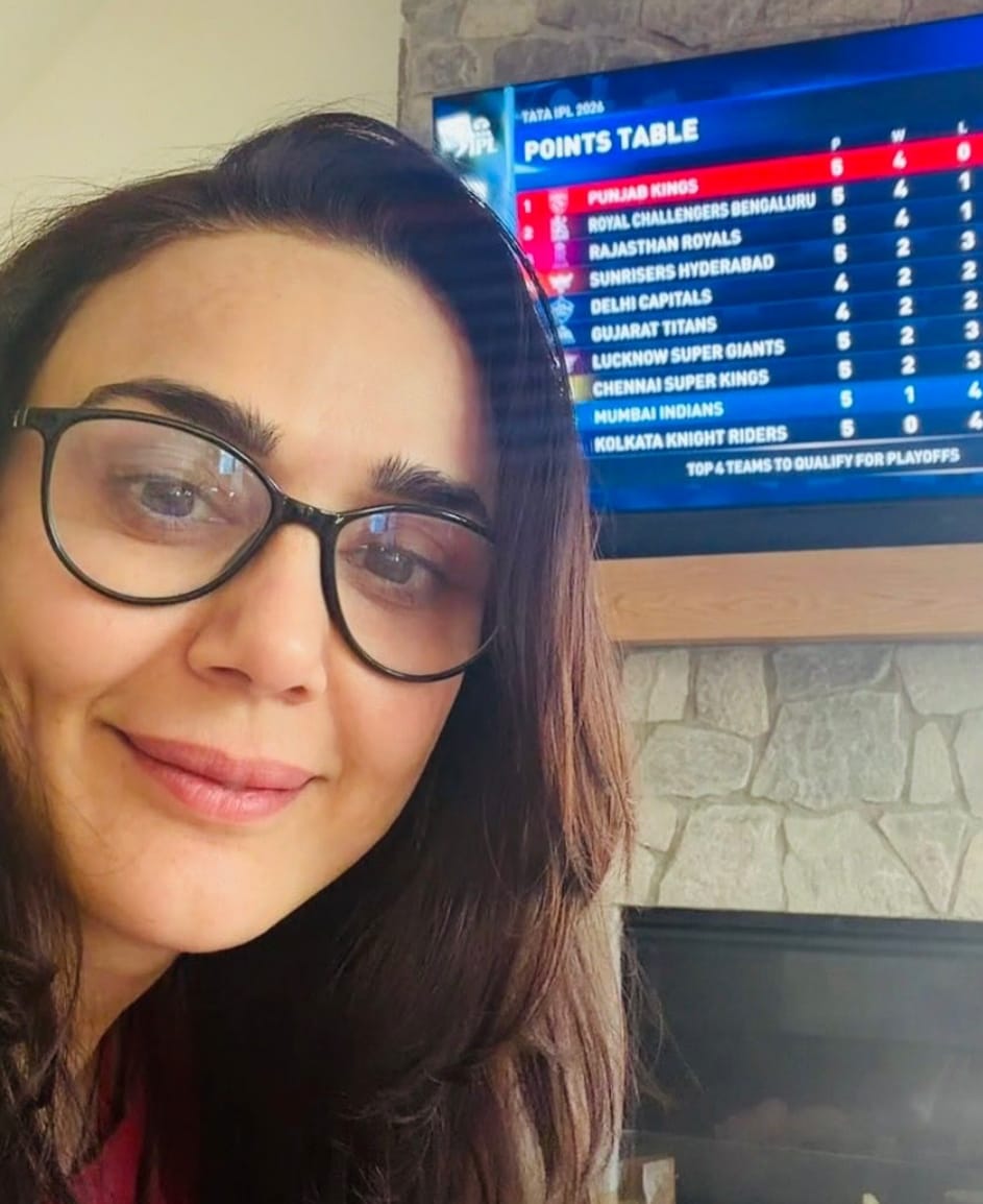 Preity Zinta smiling watching Punjab Kings IPL win on TV Preity Zinta smiling watching Punjab Kings IPL win on TV