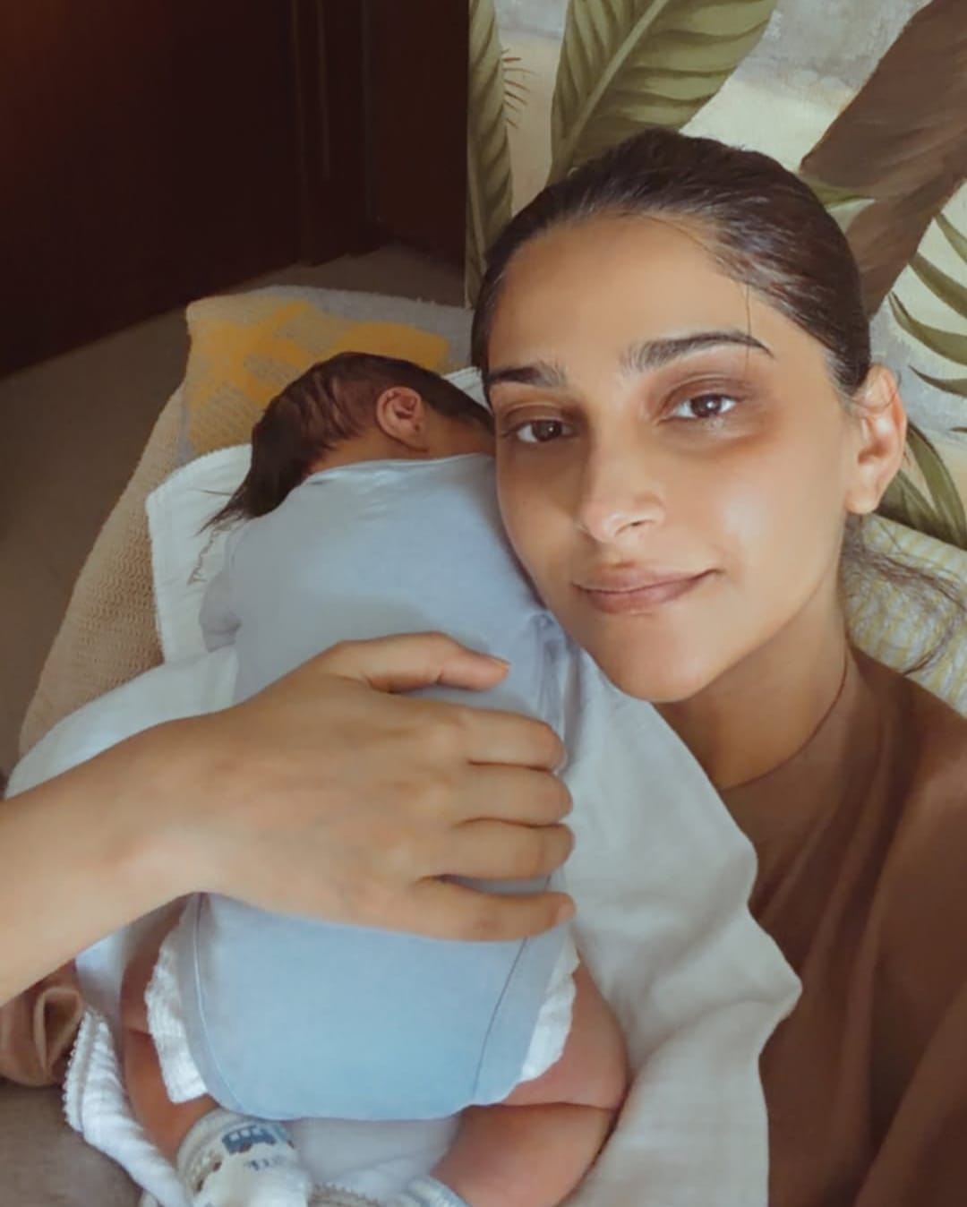Sonam Kapoor holding her newborn son in a candid Instagram photo Sonam Kapoor holding her newborn son in a candid Instagram photo