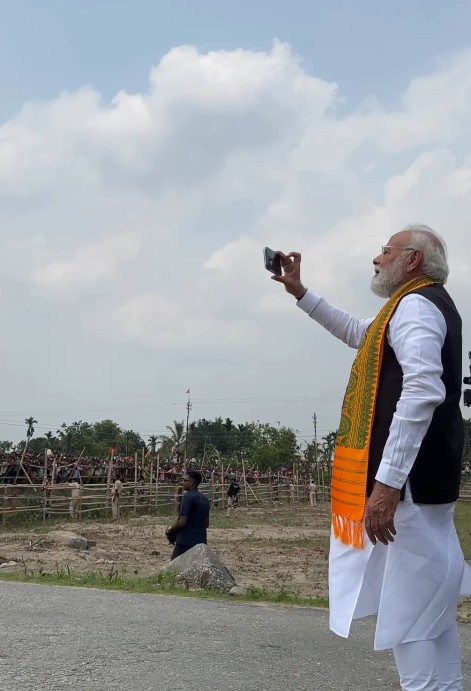 PM Modi at Siliguri rally capturing crowd on phone PM Modi at Siliguri rally capturing crowd on phone