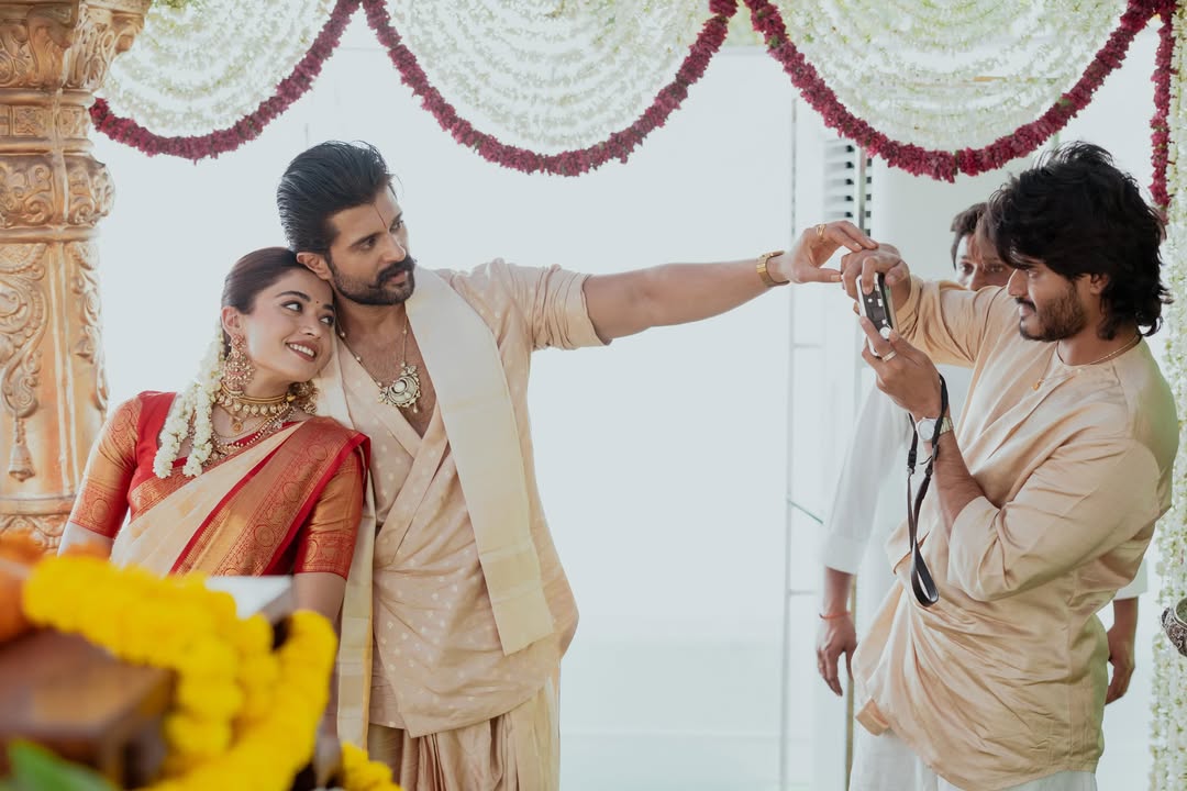 Anand Deverakonda and Vijay Deverakonda sharing a light conversation during wedding rituals Anand Deverakonda and Vijay Deverakonda sharing a light conversation during wedding rituals