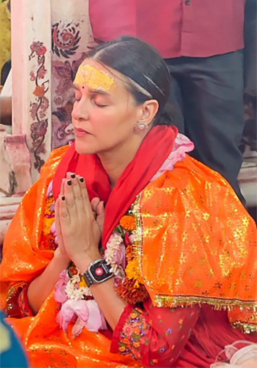 Neha Dhupia during her first visit to Vrindavan wearing red ethnic wear Neha Dhupia during her first visit to Vrindavan wearing red ethnic wear