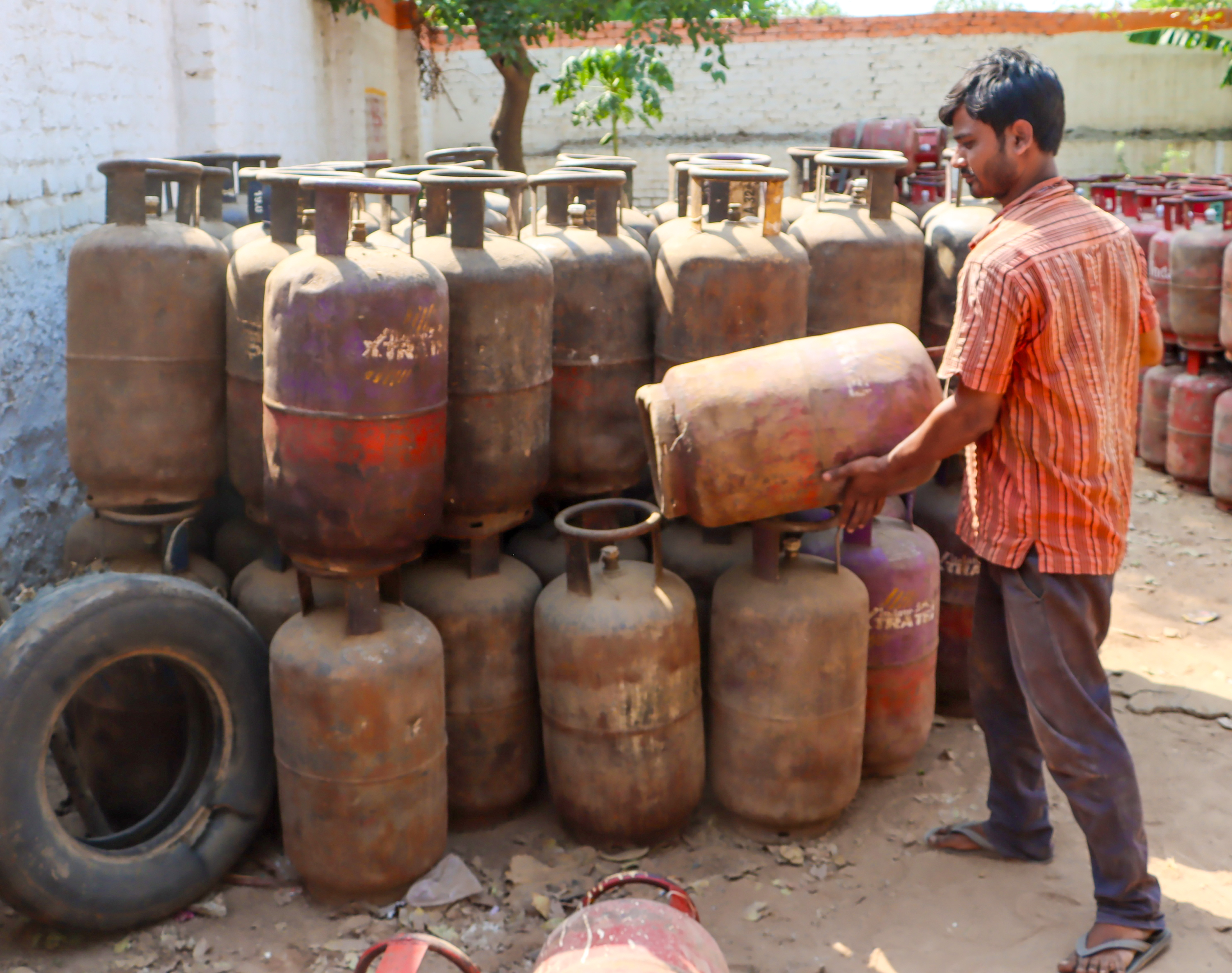 Domestic LPG cylinders being delivered to a home Domestic LPG cylinders being delivered to a home