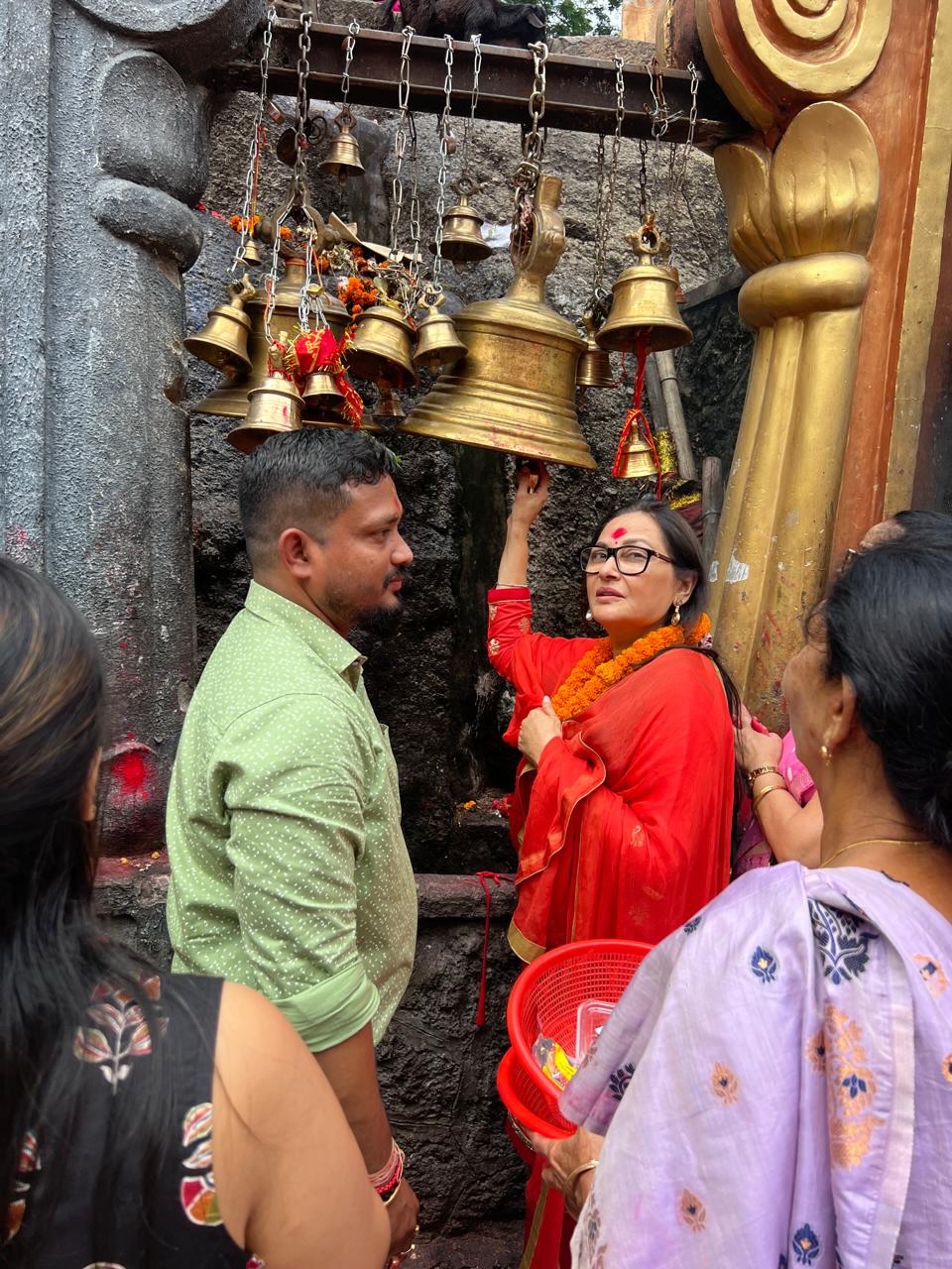 Jaya Prada at Kamakhya Temple with pooja thali in orange attire Jaya Prada at Kamakhya Temple with pooja thali in orange attire