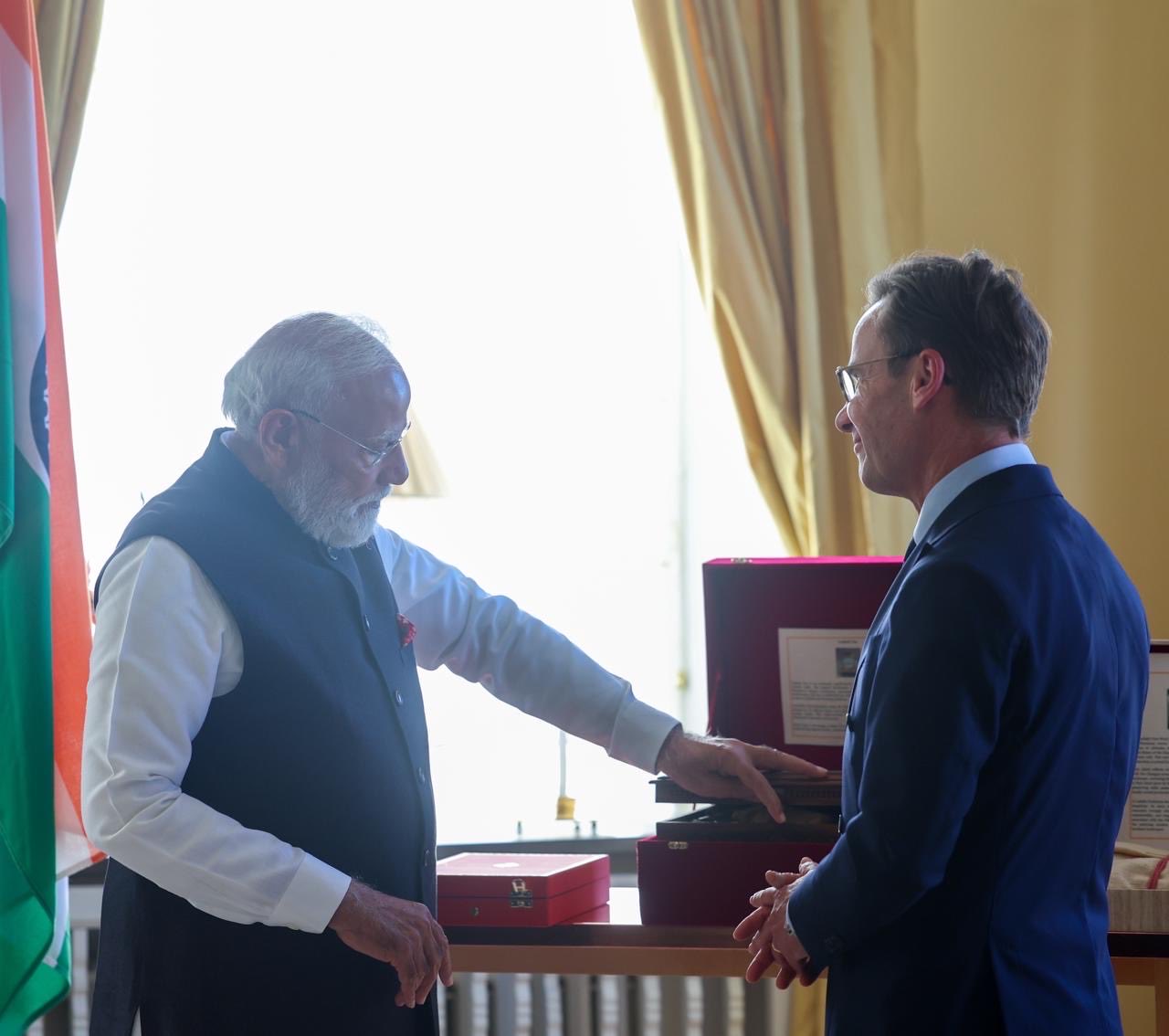 PM Modi receiving Royal Order of the Polar Star from Swedish Crown Princess PM Modi receiving Royal Order of the Polar Star from Swedish Crown Princess