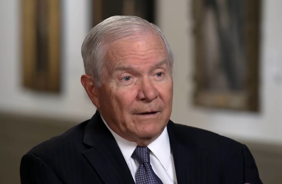 Former US Defence Secretary Robert Gates speaking at a podium about wartime footing to counter China Former US Defence Secretary Robert Gates speaking at a podium about wartime footing to counter China