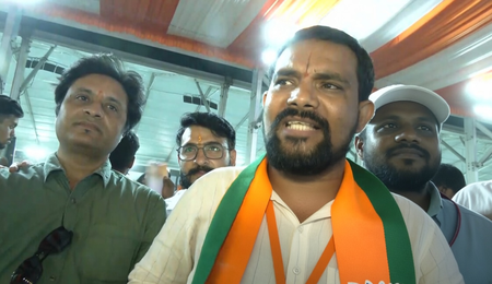 BJP supporters at PM Modi's Hyderabad rally expressing confidence for BJP government in Telangana BJP supporters at PM Modi's Hyderabad rally expressing confidence for BJP government in Telangana