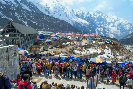 Char Dham Yatra pilgrims traveling cautiously in rain under orange alert Char Dham Yatra pilgrims traveling cautiously in rain under orange alert