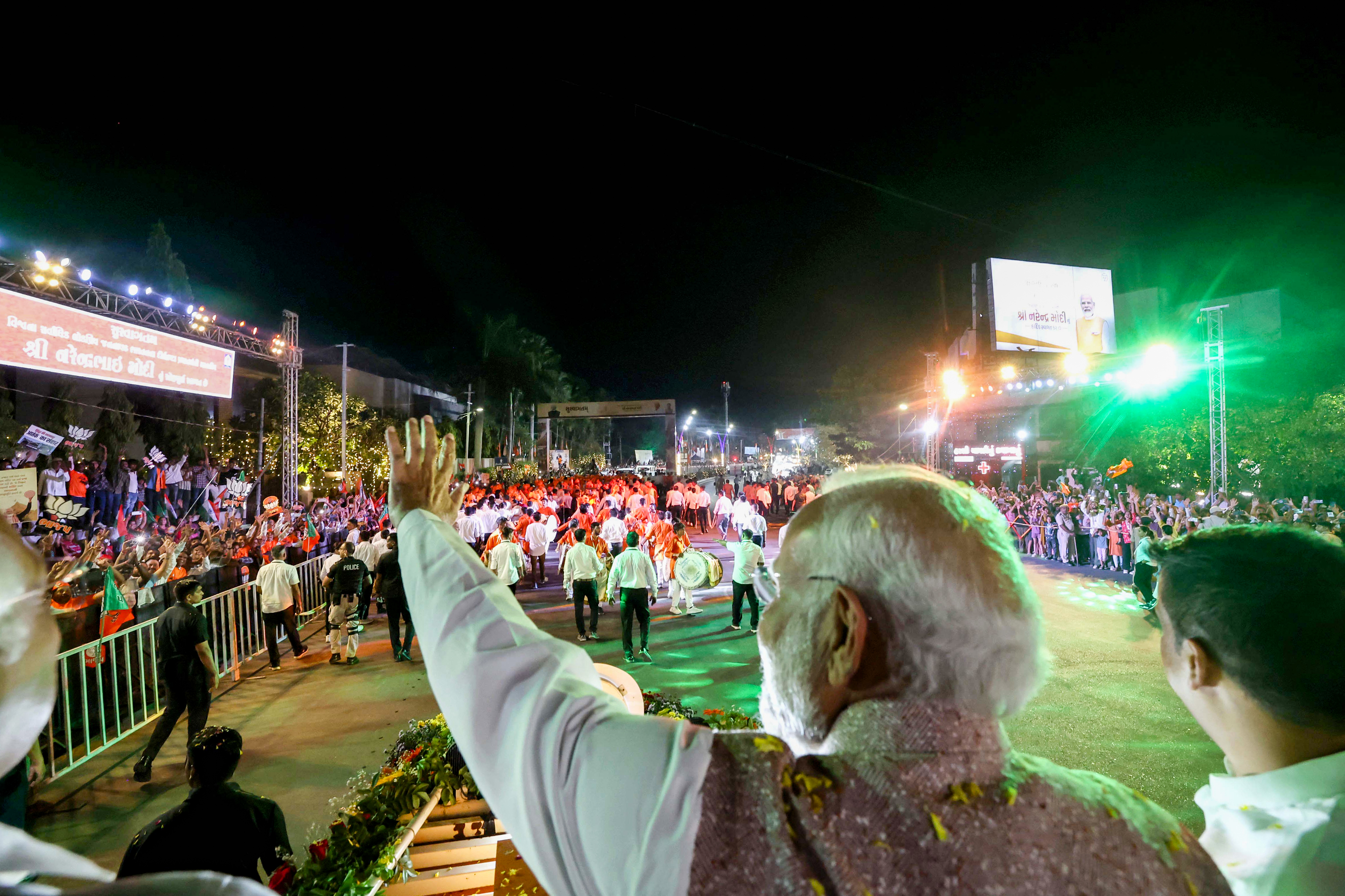 PM Modi waving during Vadodara roadshow at Gujarat visit PM Modi waving during Vadodara roadshow at Gujarat visit