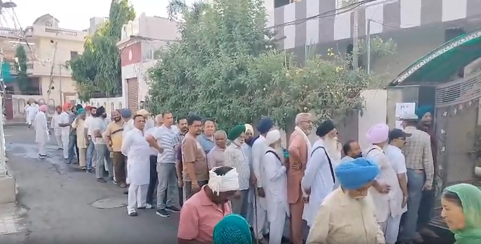 Voters lining up at polling stations for Punjab civic polls litmus test AAP Voters lining up at polling stations for Punjab civic polls litmus test AAP
