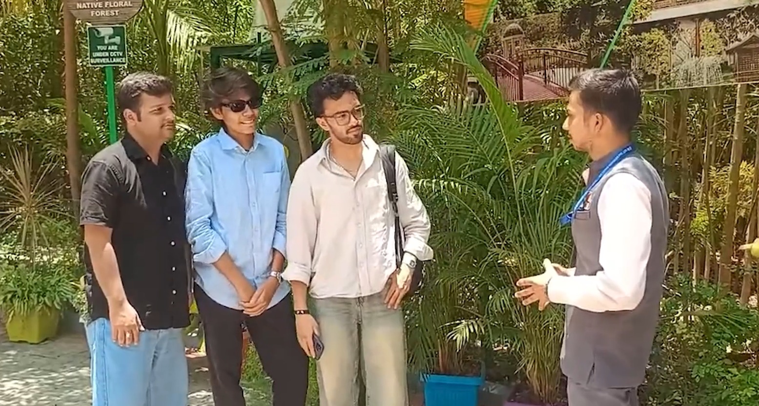 Trained tourist guide explaining Statue of Unity to visitors at Gujarat attraction Trained tourist guide explaining Statue of Unity to visitors at Gujarat attraction