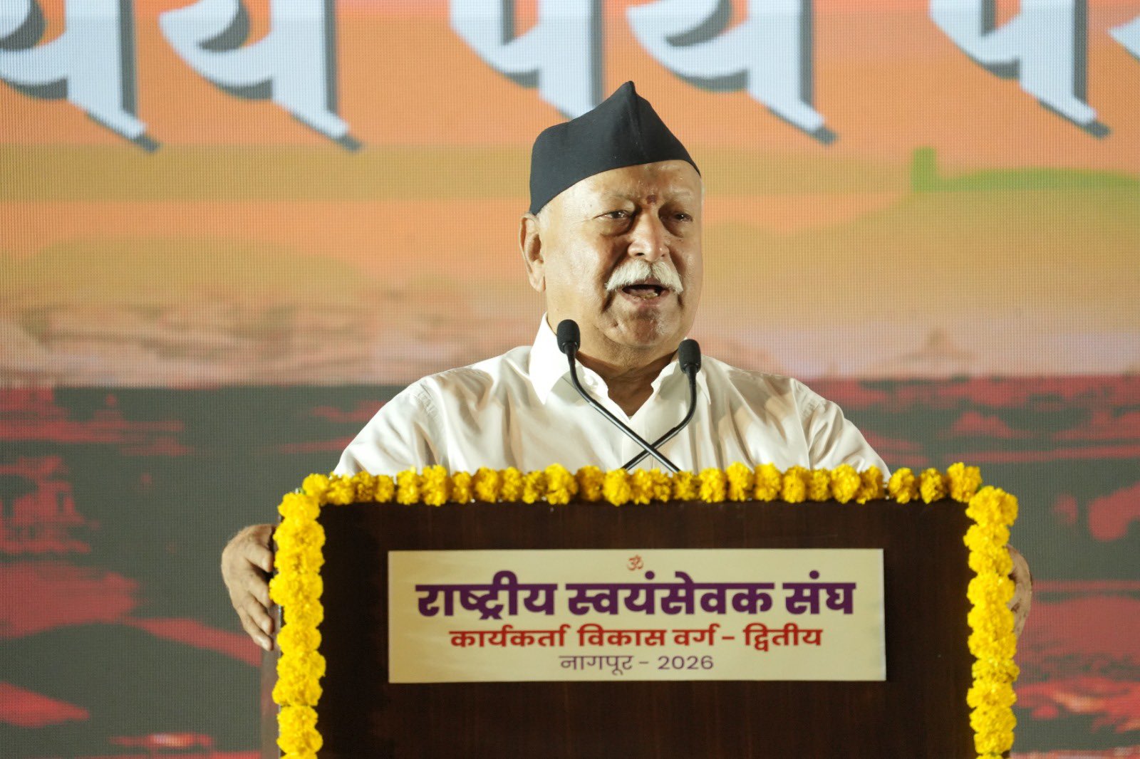 RSS chief Mohan Bhagwat addressing a gathering with industrialists RSS chief Mohan Bhagwat addressing a gathering with industrialists