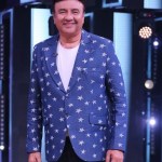 Anu Malik and Dharmendra sharing a light moment discussing favorite song Anu Malik and Dharmendra sharing a light moment discussing favorite song