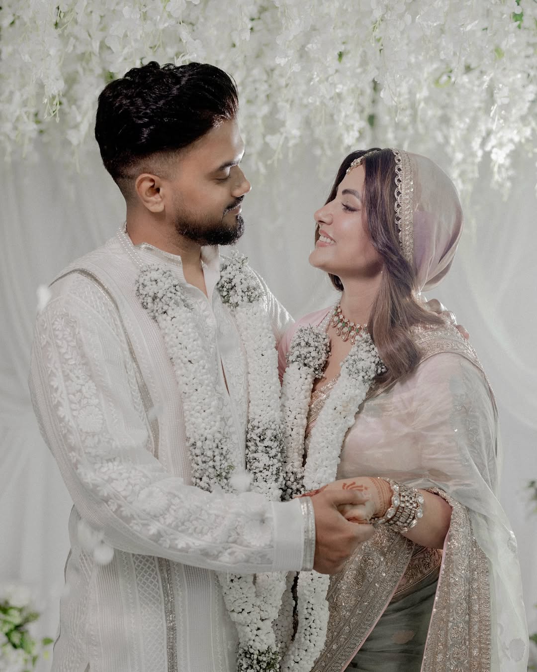 Hina Khan and Rocky Jaiswal celebrating their first anniversary with bouquets Hina Khan and Rocky Jaiswal celebrating their first anniversary with bouquets