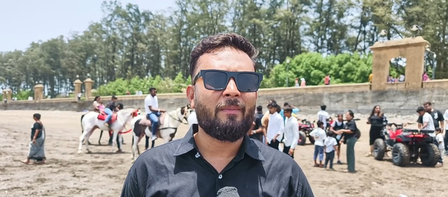Tourists enjoying Daman mini Goa beaches during summer holidays Tourists enjoying Daman mini Goa beaches during summer holidays