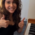 Sharvari playing Maskara on piano in all-black outfit Sharvari playing Maskara on piano in all-black outfit