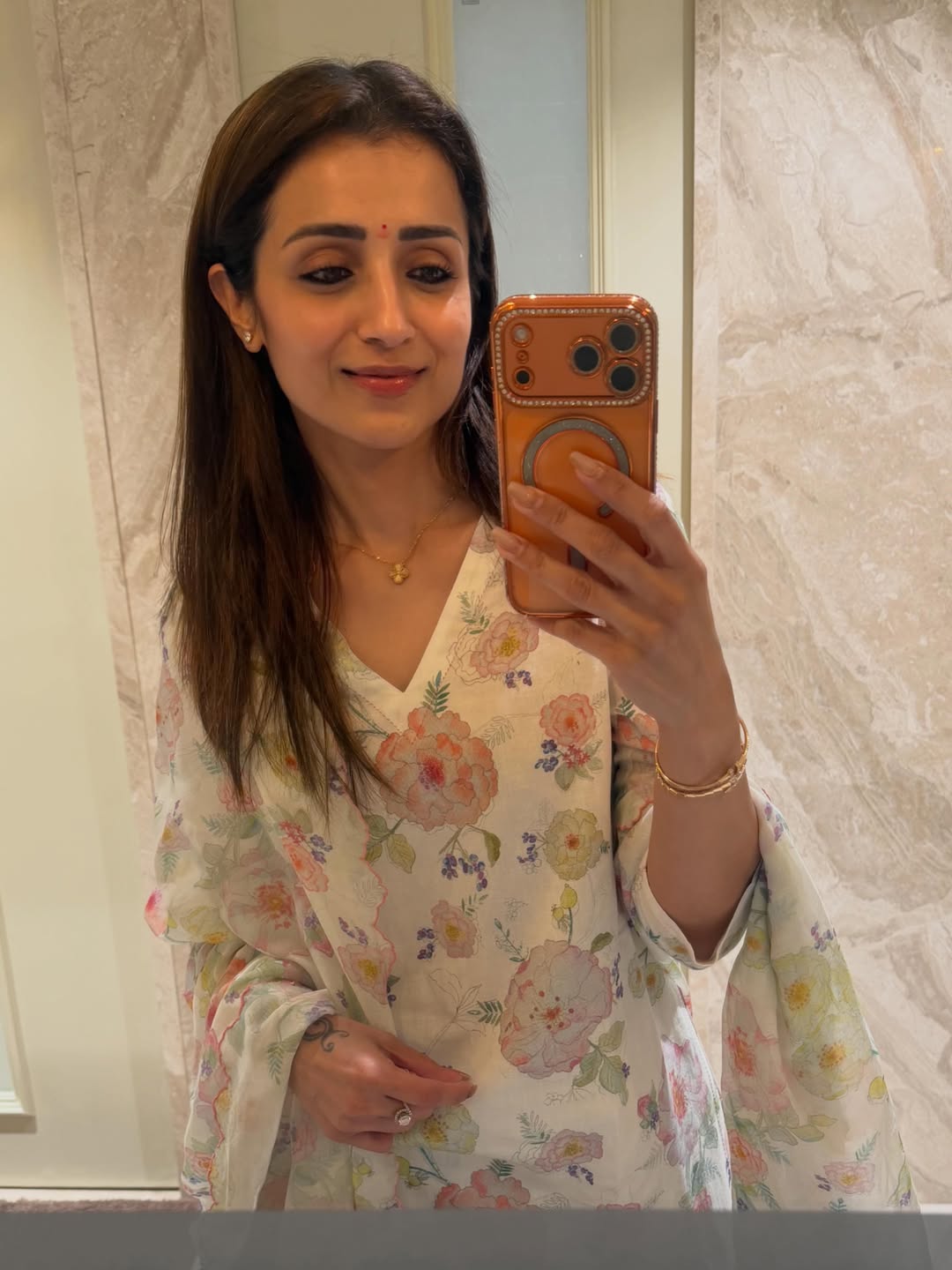 Trisha smiles in a selfie with her dog during her Magical May Trisha smiles in a selfie with her dog during her Magical May