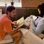 Randeep Hooda reading a book to baby Nyomica with wife Lin Laishram Randeep Hooda reading a book to baby Nyomica with wife Lin Laishram