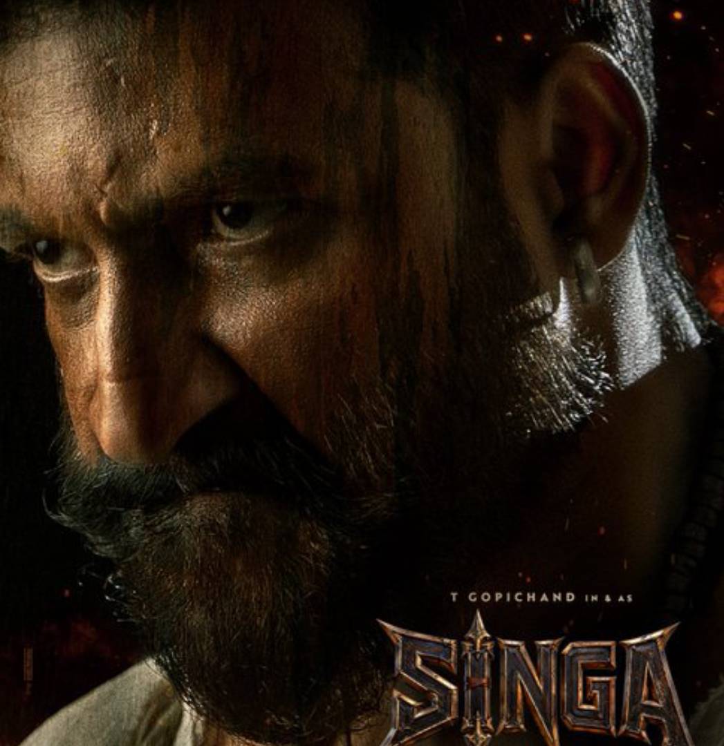 Gopichand holding an axe with a menacing look in the forest for Singa movie Gopichand holding an axe with a menacing look in the forest for Singa movie