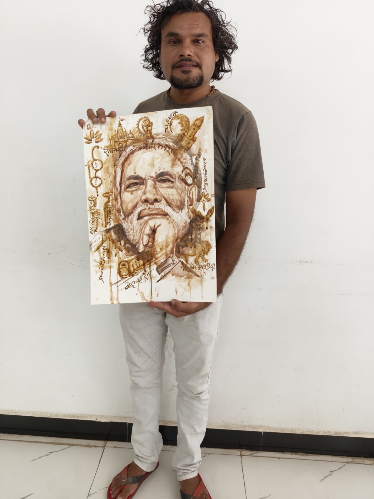 Unique art Neemush artist painting Modi portrait with tea Unique art Neemush artist painting Modi portrait with tea