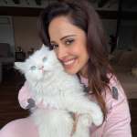 Nushrratt Bharuccha cuddling her cat during monsoon rains Nushrratt Bharuccha cuddling her cat during monsoon rains