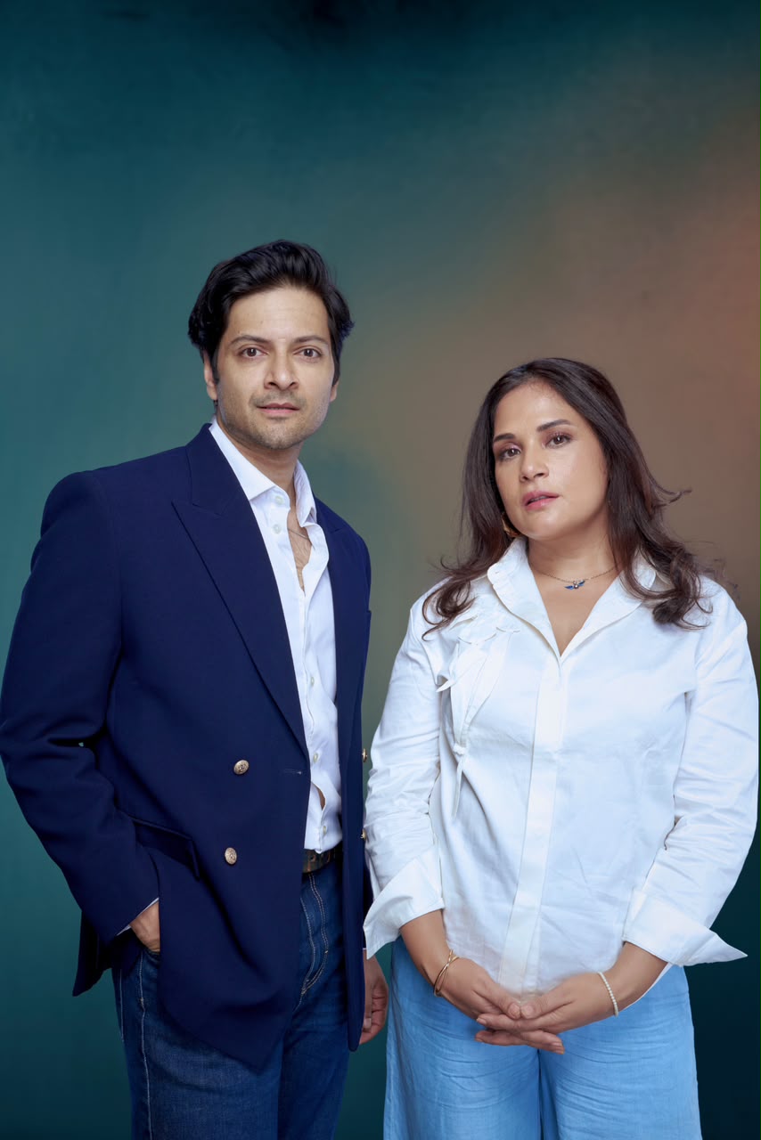 Richa Chadha and Ali Fazal smiling together in a promotional still from their new film Richa Chadha and Ali Fazal smiling together in a promotional still from their new film