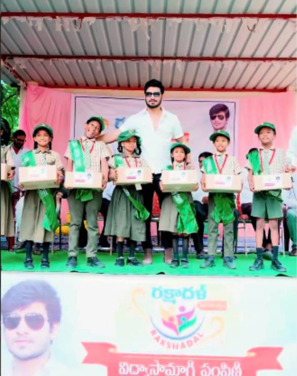 Nikhil Siddhartha gifting study kits to students in Bhimavaram for Swayambhu promotion Nikhil Siddhartha gifting study kits to students in Bhimavaram for Swayambhu promotion
