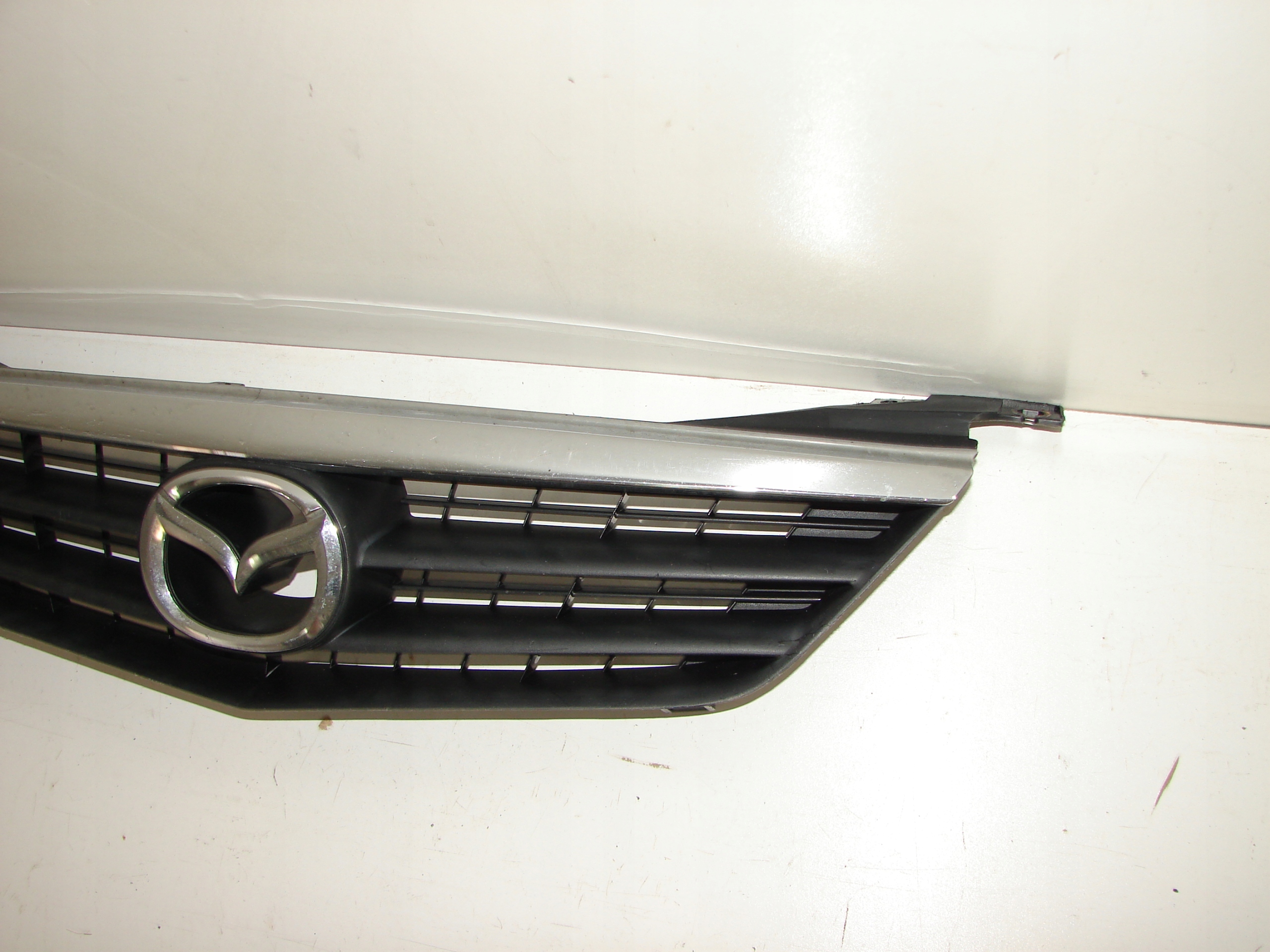 MRIEZKA LISTA MAZDA 626 00-02