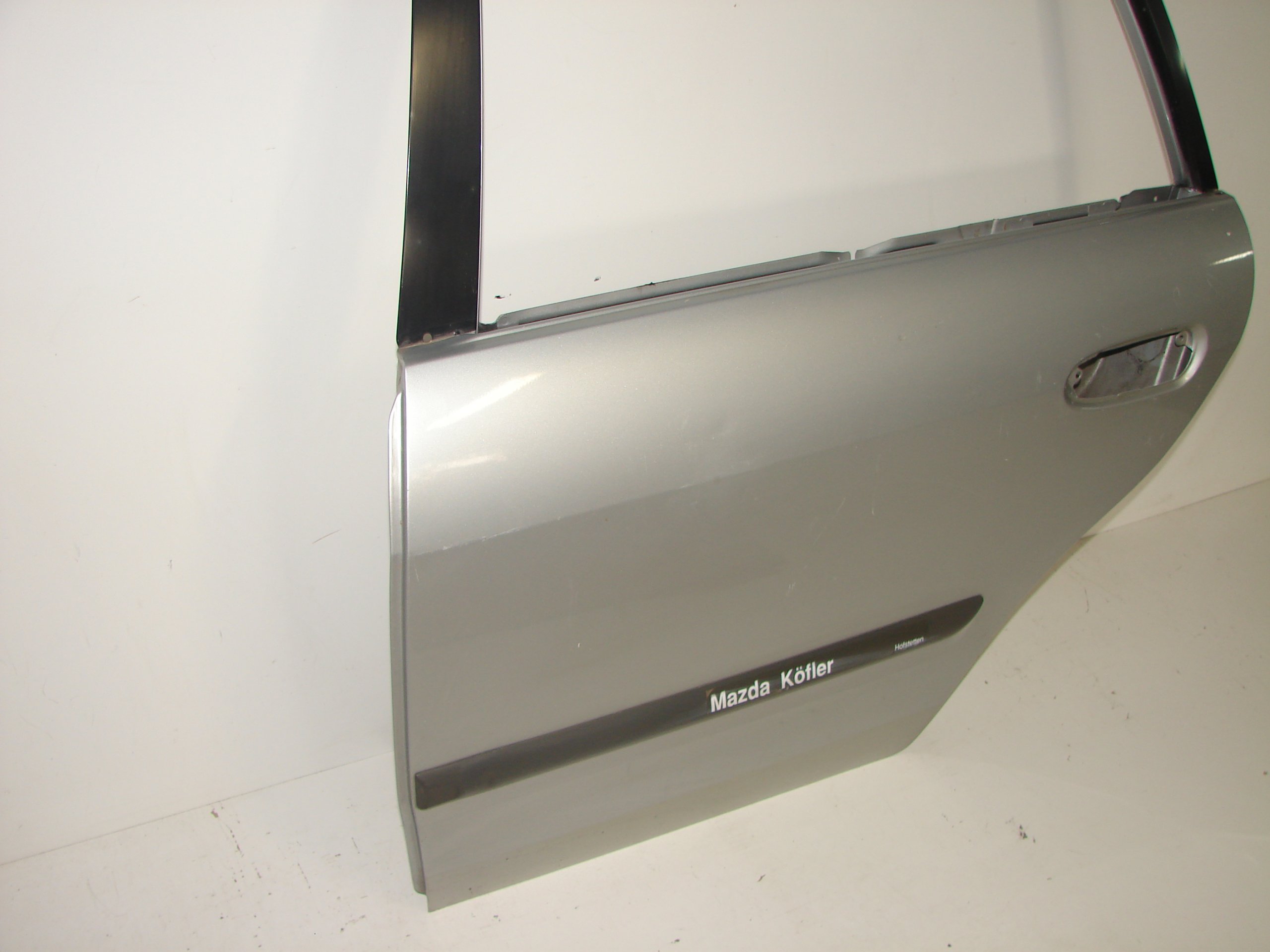 LAVE ZADNE DVERE MAZDA 626 GW 98-02 KOMBI