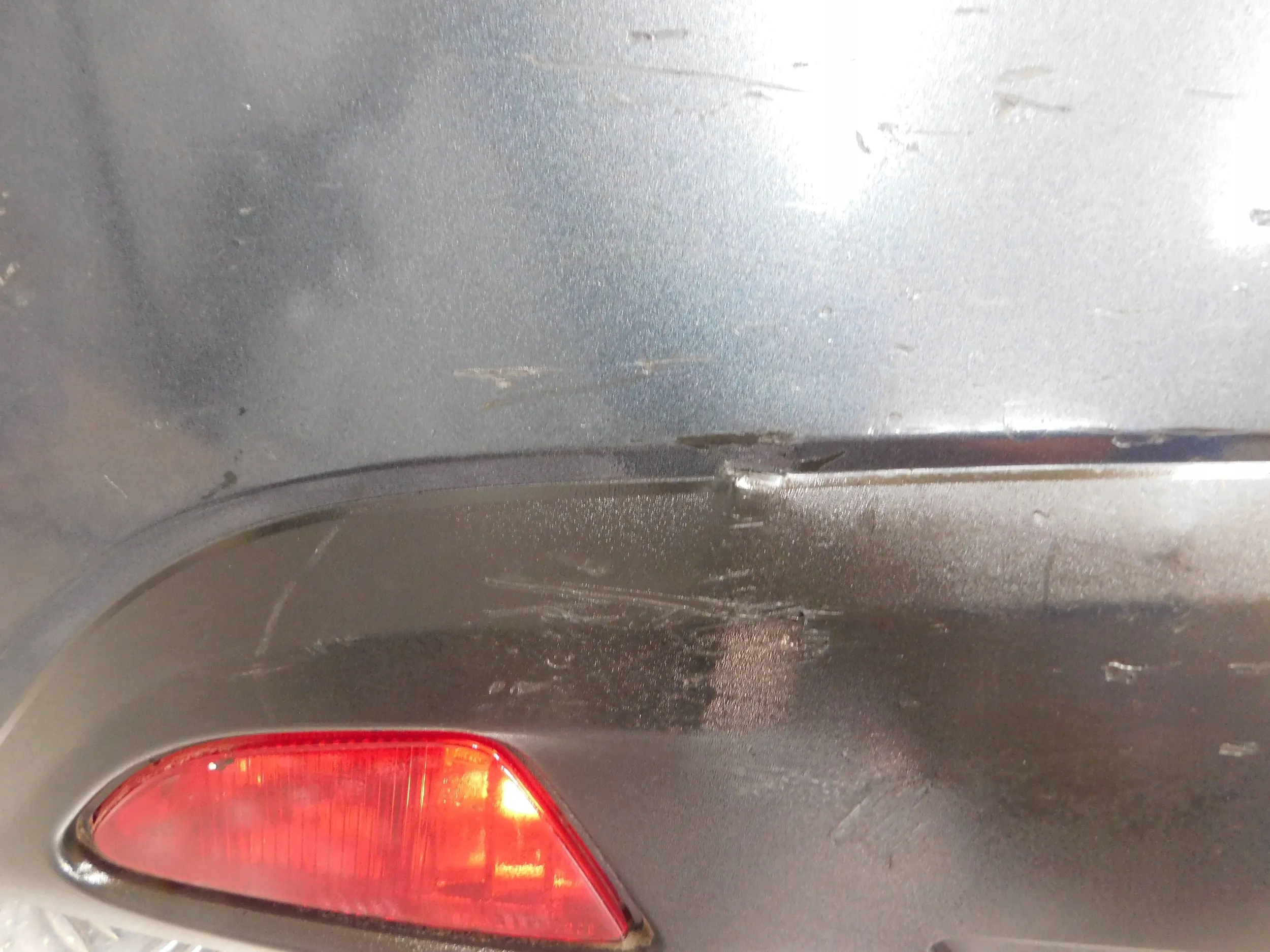 ZADNÝ NÁRAZNÍK MAZDA 2 DE 07-