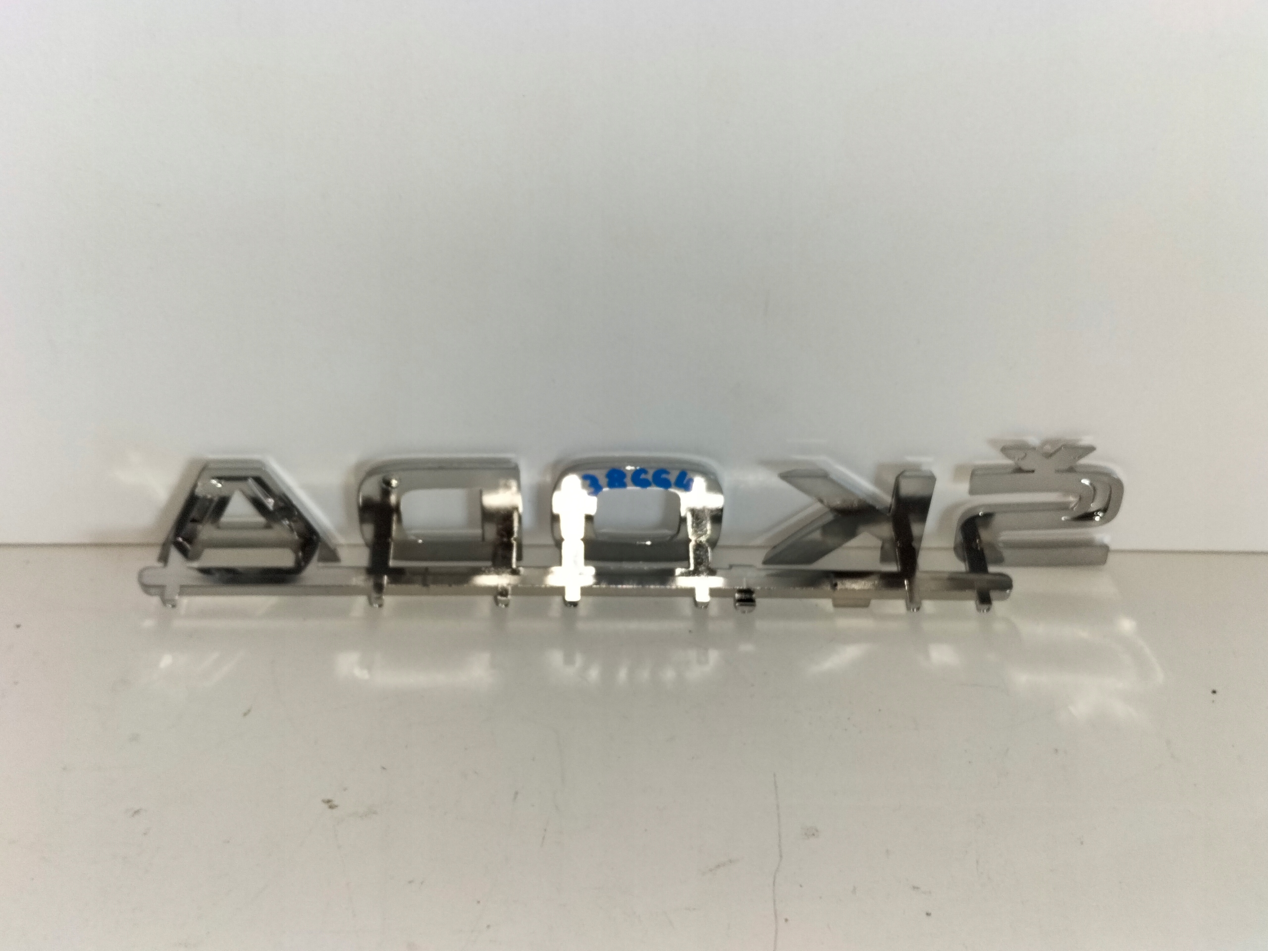 ZNAK EMBLEM LOGO ZADNEJ KAPOTY SKODA