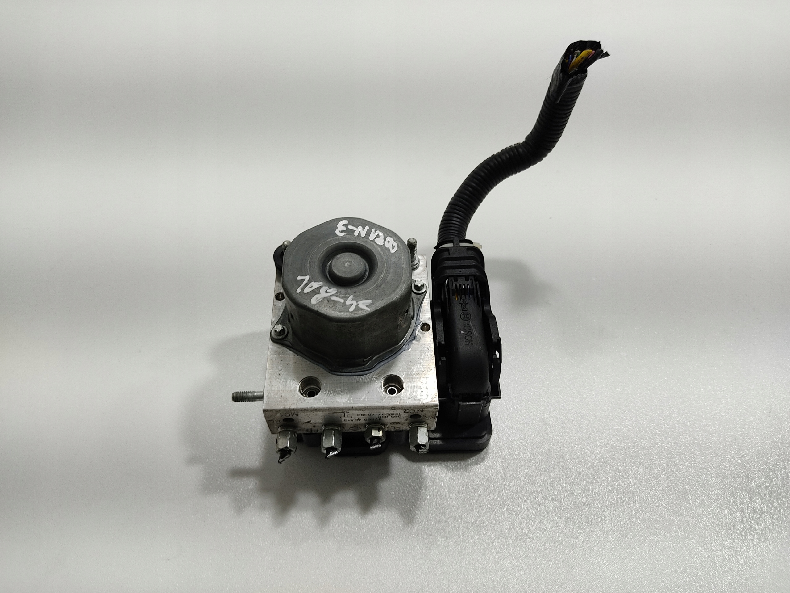 RIADIACA JEDNOTKA KOCKA ABS NISSAN E-NV200 476604FA01 0265243141 0265956165 2014-21