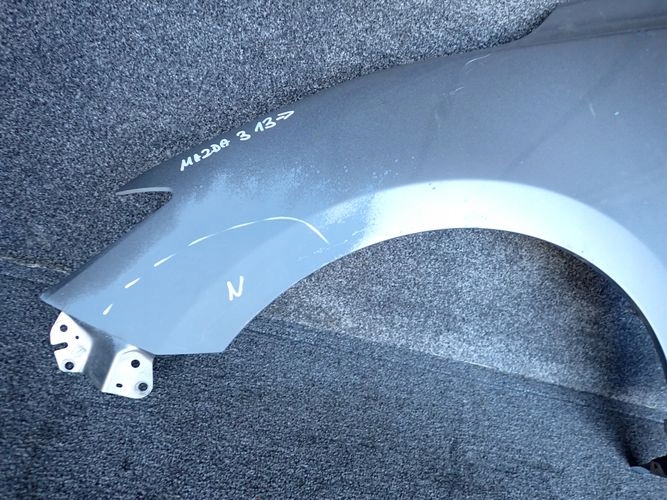 MAZDA 3 13- ĽAVÝ PREDNÝ BLATNÍK