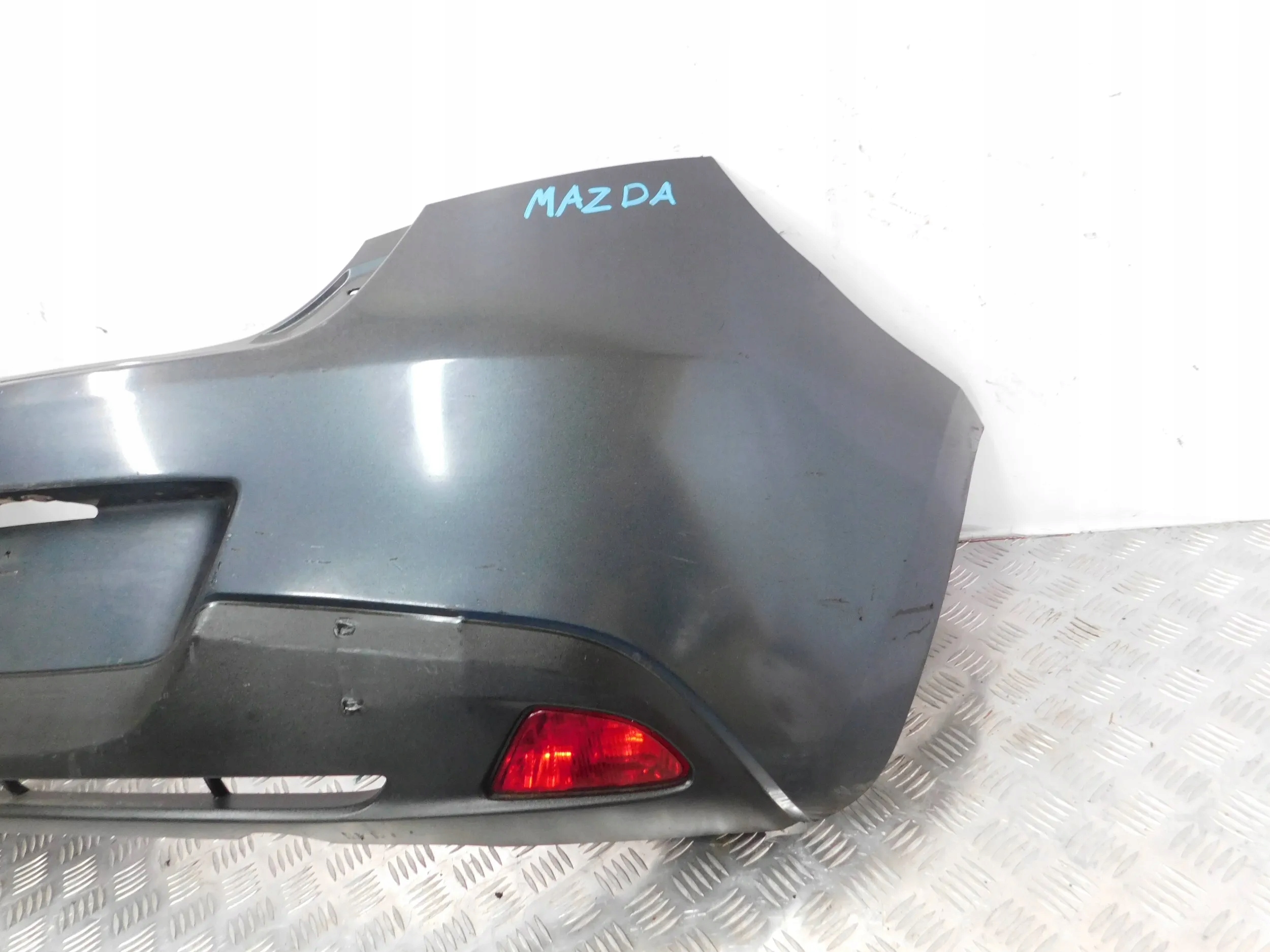 ZADNÝ NÁRAZNÍK MAZDA 2 DE 07-