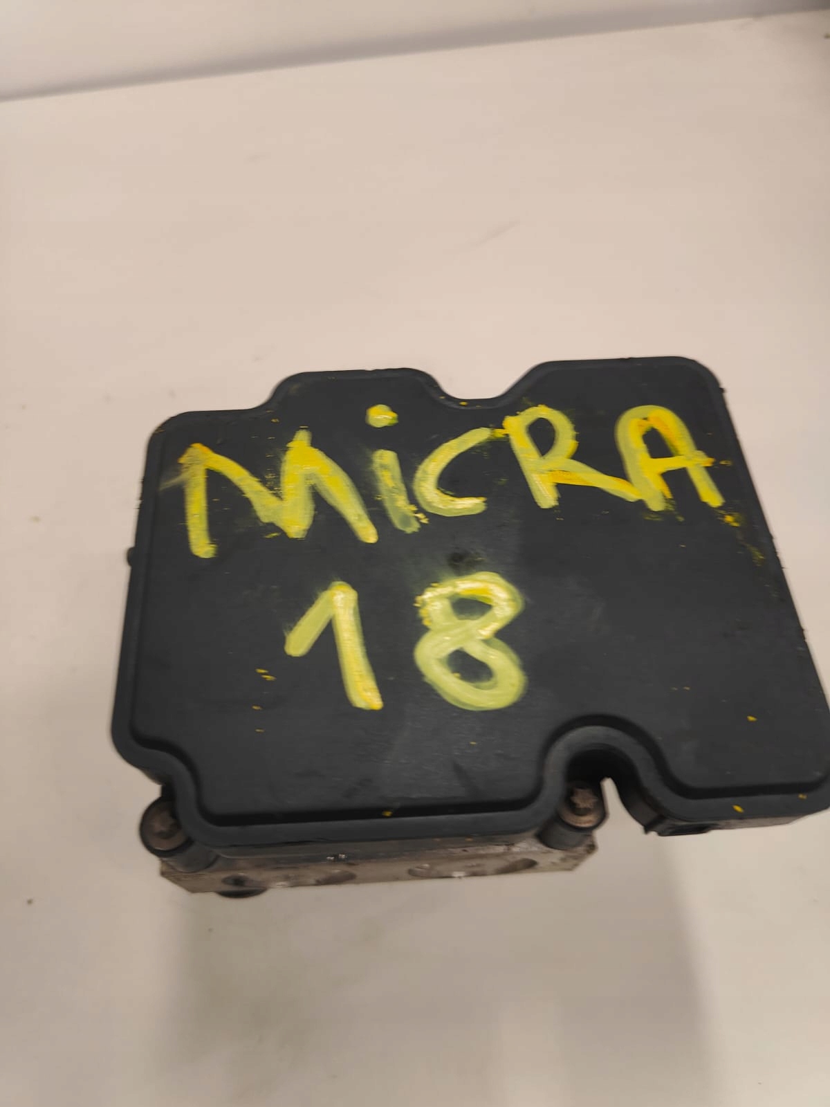 Nissan micra 476603hm5a RIADIACA JEDNOTKA KOCKA ABS