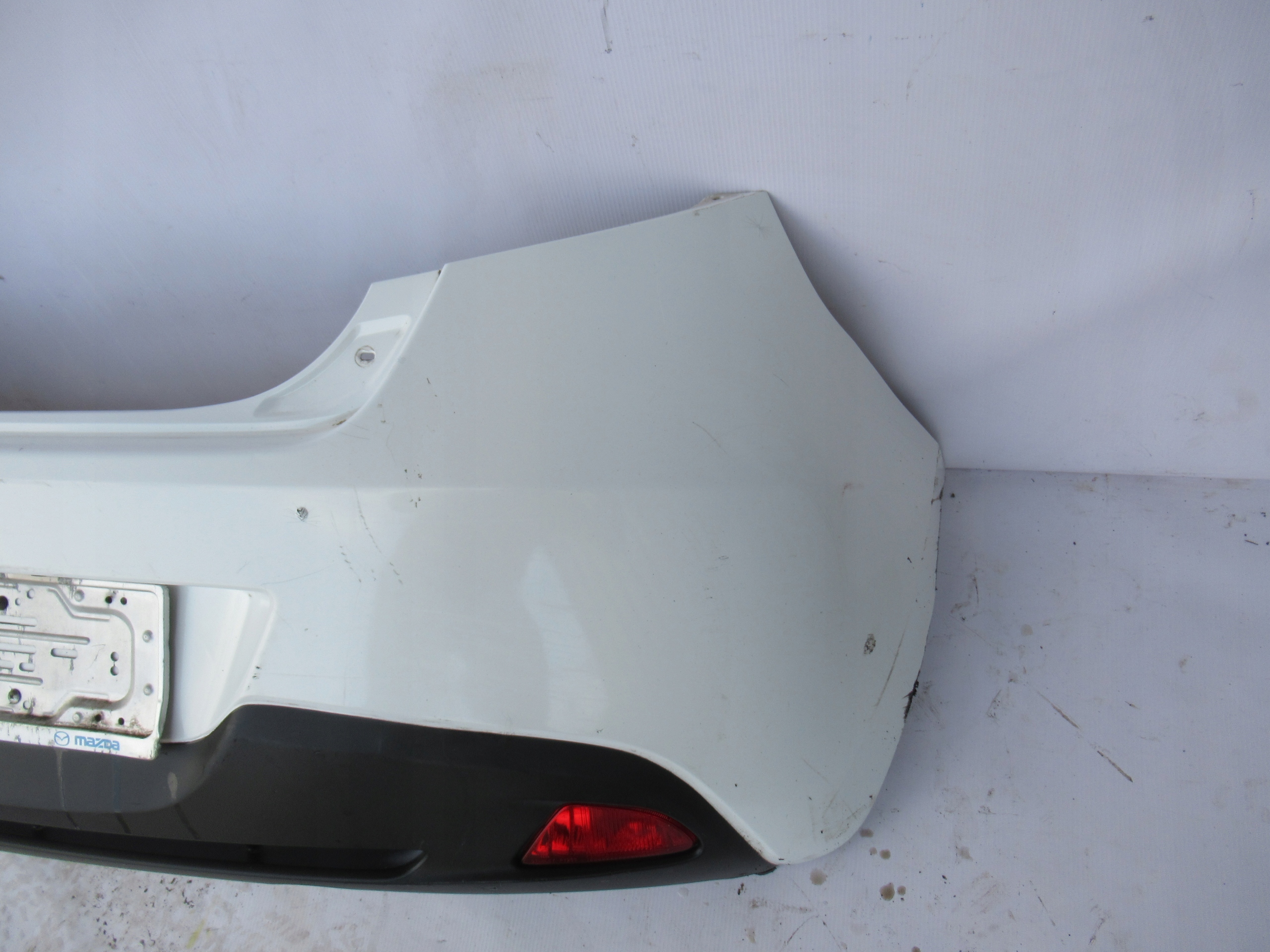 ZADNÝ NÁRAZNÍK MAZDA 2 07-