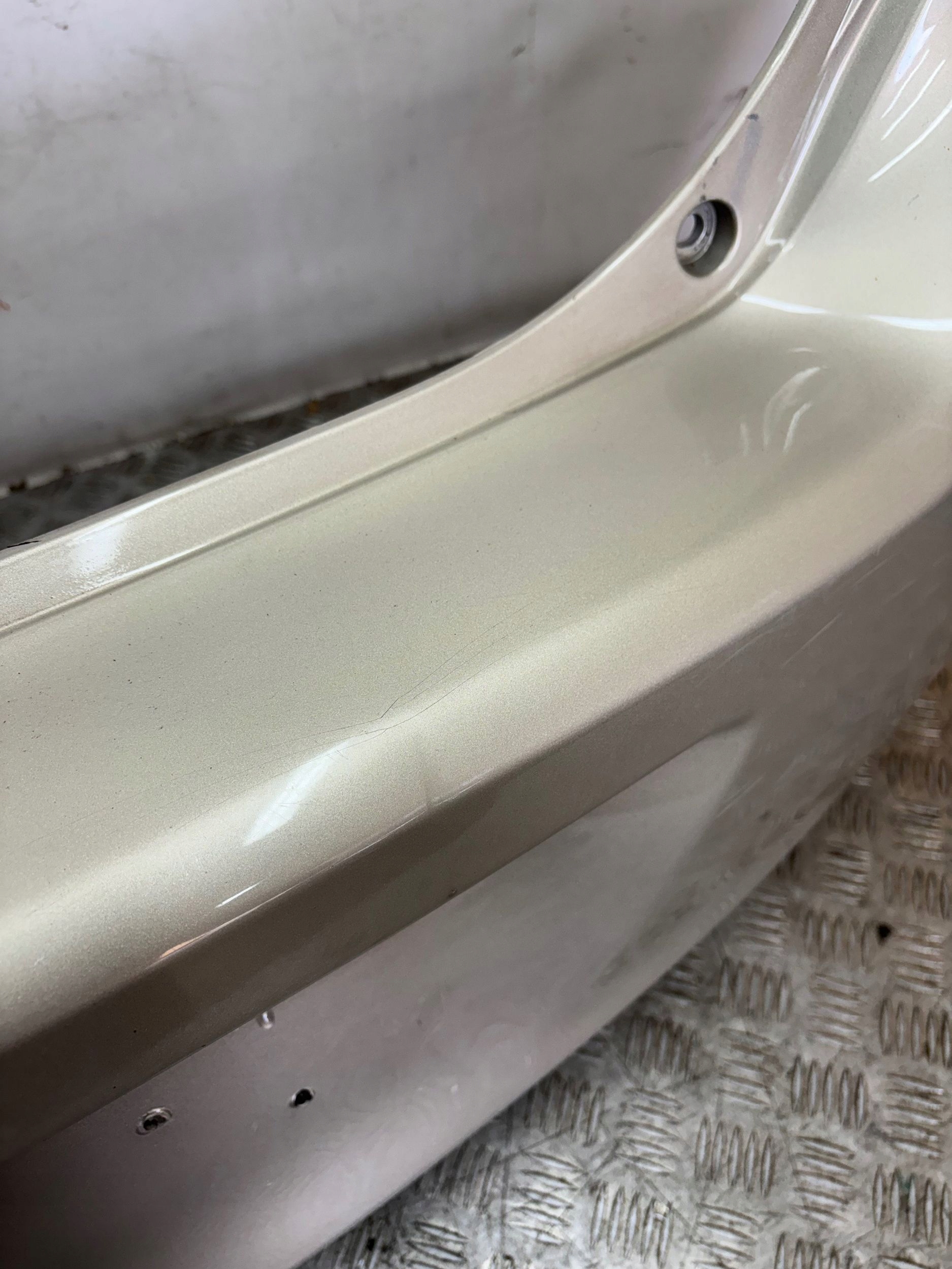 ZADNÝ NÁRAZNÍK TOYOTA YARIS II 2 LIFT 09-