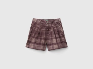 Bermuda à jambes courbes à motifs carrés avec poche Bermuda à jambes courbes à motifs carrés avec poche