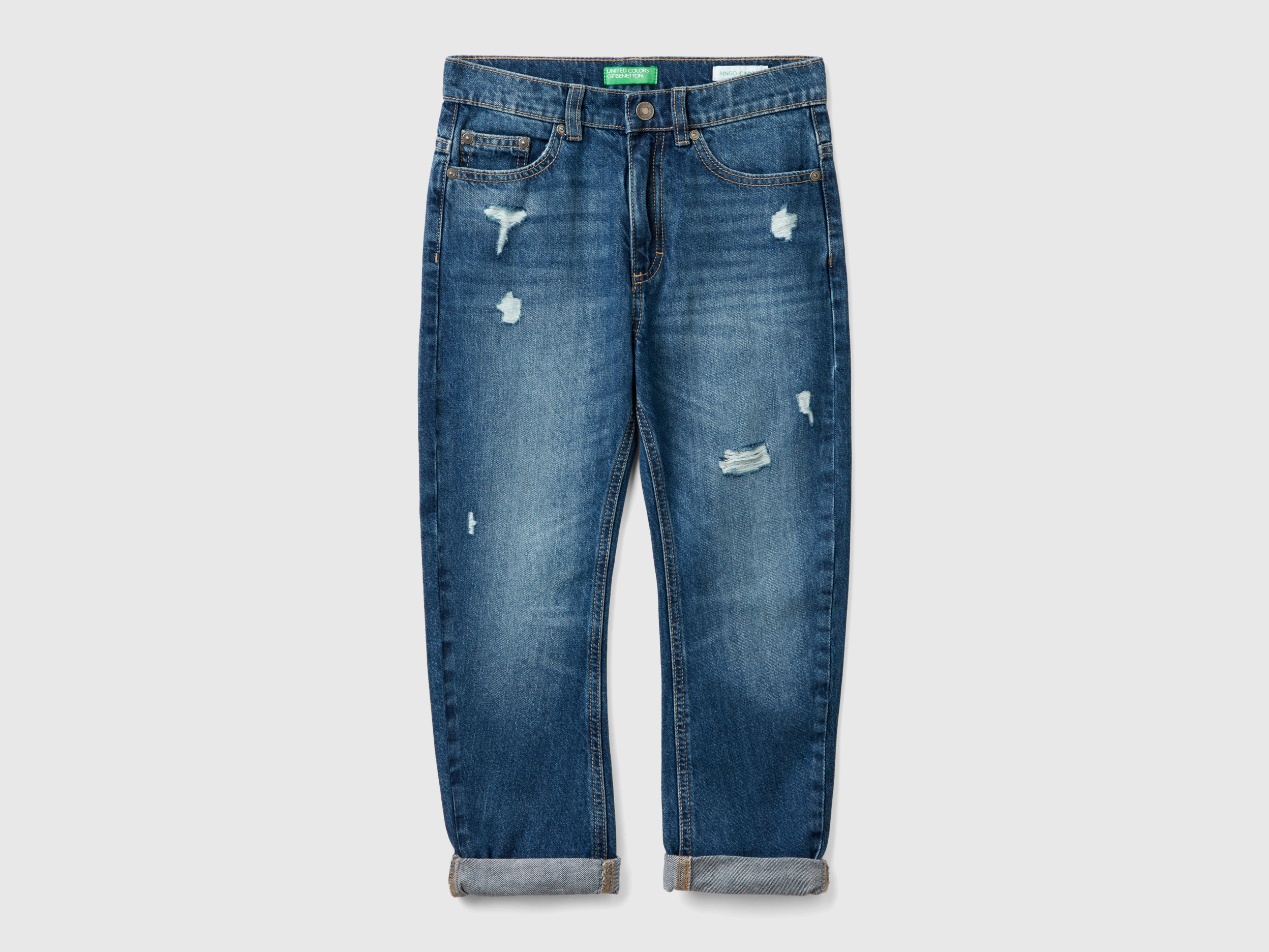 Jean coupe carotte avec déchirures Jean coupe carotte avec déchirures